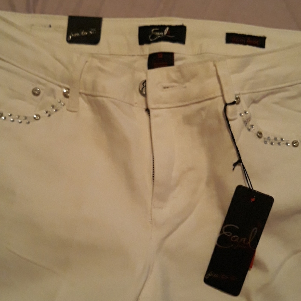 White jeans with bling pockets